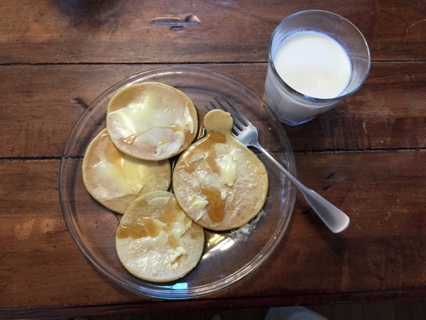 Box Paleo Pancake mix made and on a plate with milk