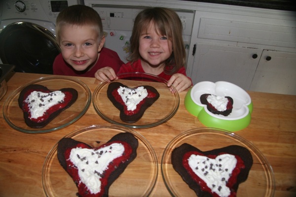 Children with chocolate pancakes